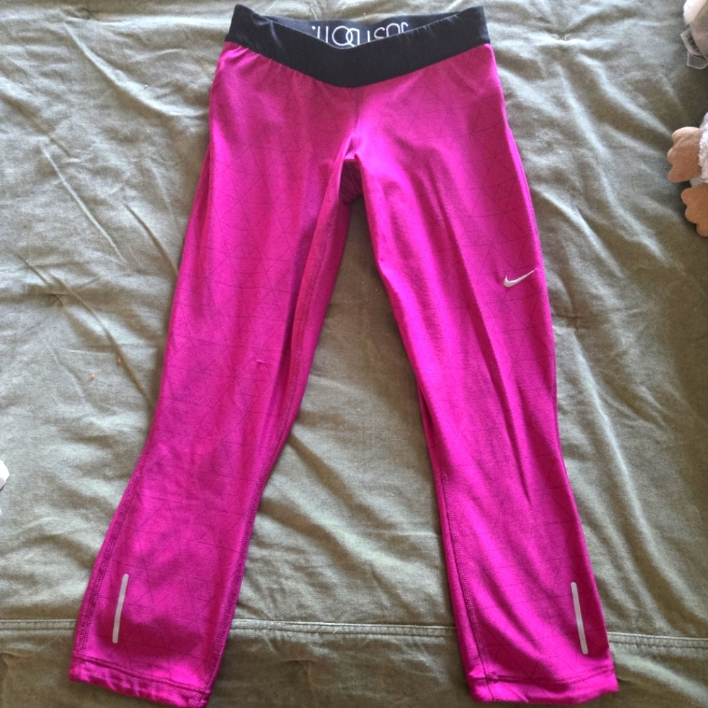 Nike DriFit women's leggings,  size small,  pink and black.  Good condition.